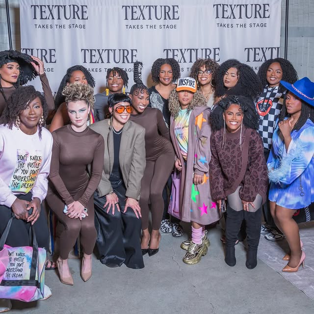 Attendees at the Texture Takes the Stage step and repeat