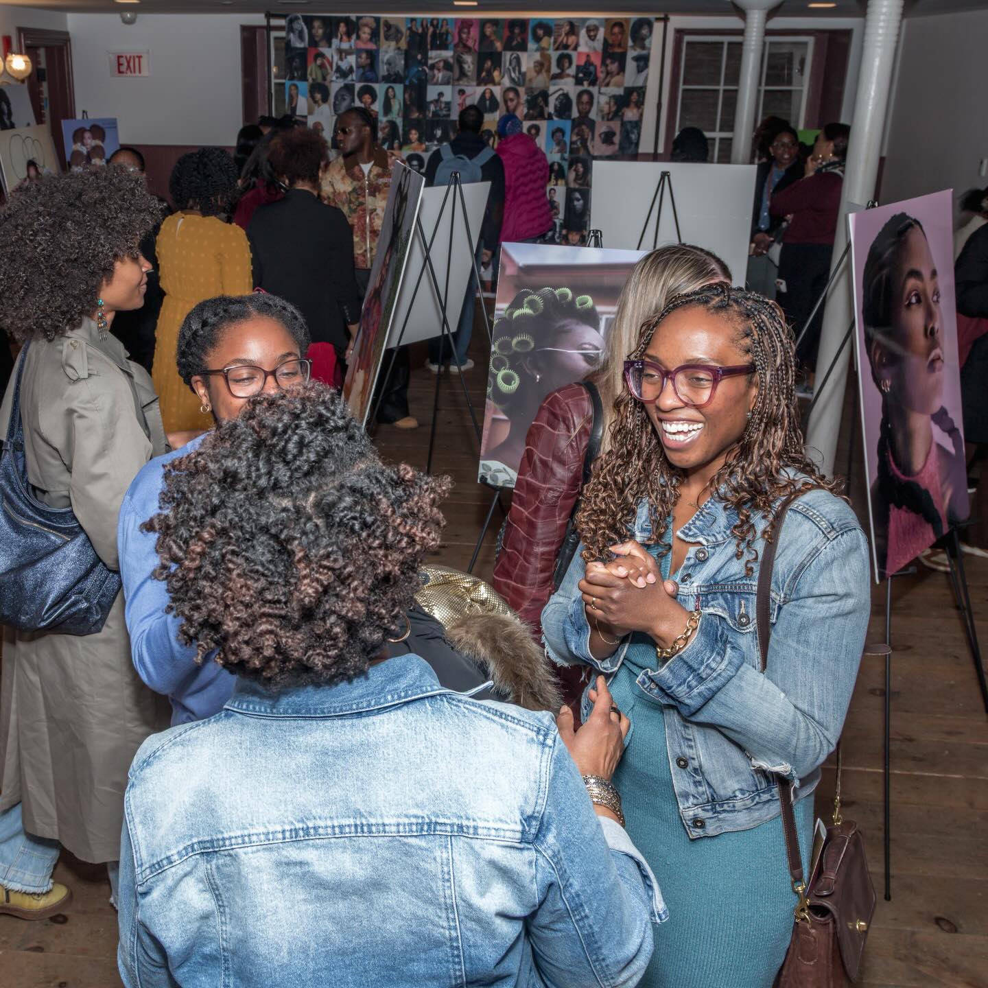 Guests mingling at the Texture Takes the Stage gallery wall